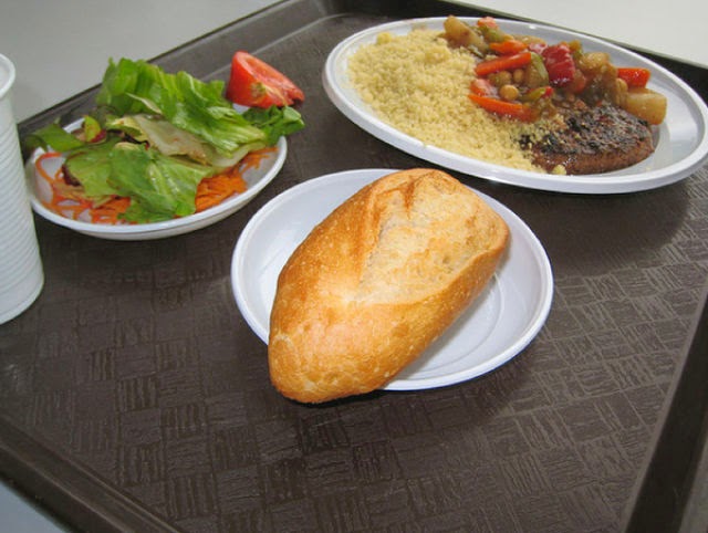 Country: France Contents: Baguette, salad, couscous, mixed veggies in sauce, meat.